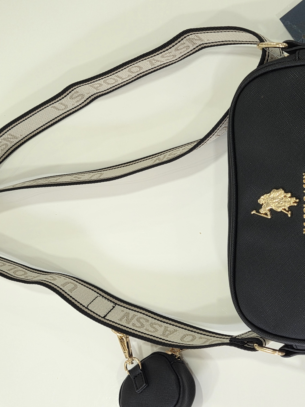 U.S. Polo Assn. Black Crossbody Bag with Gold Logo and Beige Strap